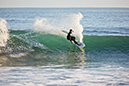Surfer (unknown) at Tauroa Point - 5 May 2010